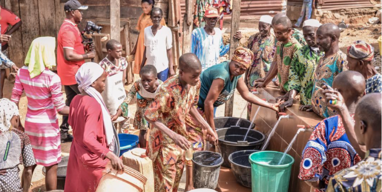 Yemetu community residents fetching water from the borehole donated by FoodCo.