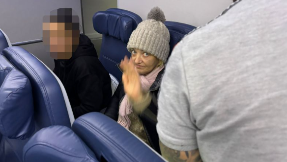 Woman who successfully stowed away on plane from US to Paris is arrested and taken back to the US